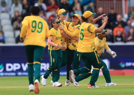 South Africa's Kayla Reyneke (third left) celebrates after taking the catch of Australia's Georgia Voll.