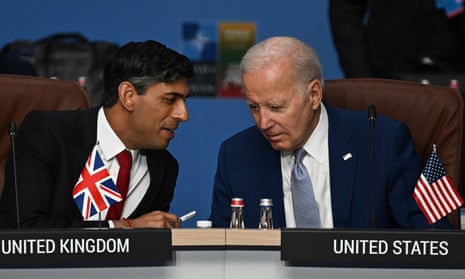 Rishi Sunak and Joe Biden confer during a Nato summit in Lithuania, July 2023