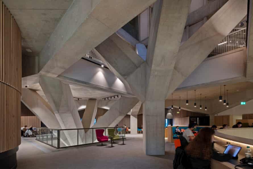 Branching out … students at work by the concrete trees.