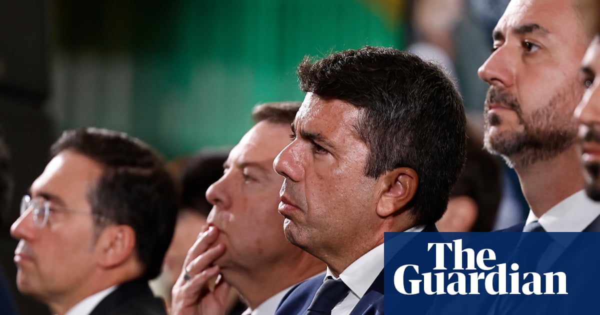 Valencia regional leader Carlos Mazón heckled at flood victims' state funeral – video