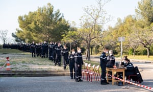 Medical staff of the Marseille Naval Fire Battalion testing sailors of the French aircraft carrier Charles De Gaulle in Saint-Mandrier, near Toulon, France, 14 April 2020.