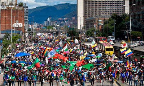 Indigenous people and students take part in a protest against the government of the Colombian president, Iván Duque, in Bogota, on 4 December 2019. 