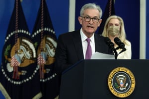 Jerome Powell speaks as Lael Brainard listens during an announcement.