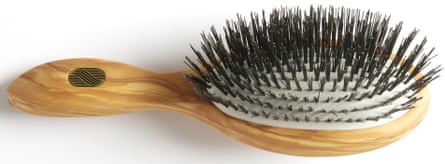 The olive wood and black bristled Altesse Beaute Gentle Detangling Hairbrush on a white background