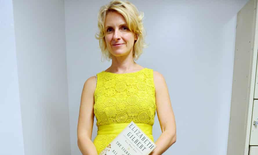 Elizabeth Gilbert with her book The Signature of all Things.