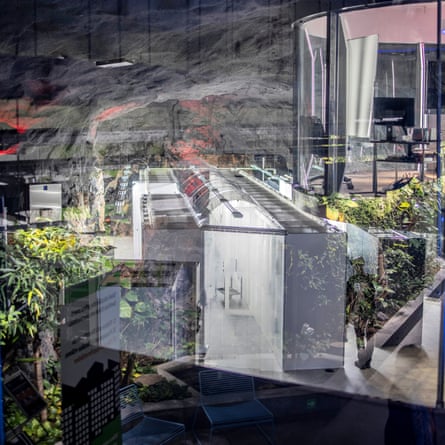 Reflections on a window overlooking machinery in the Bahnhof bunker datacentre.
