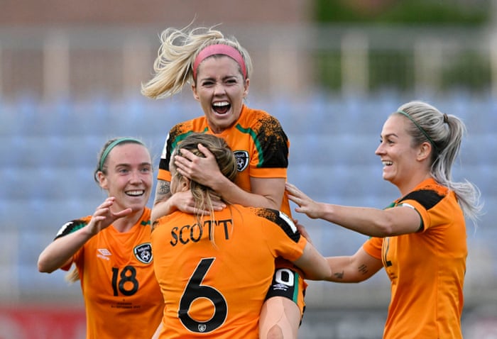 Denis O'Sullivan of the Republic of Ireland celebrates scoring his first goal with Harriet Scott, Claire O'Riordan and his teammate.