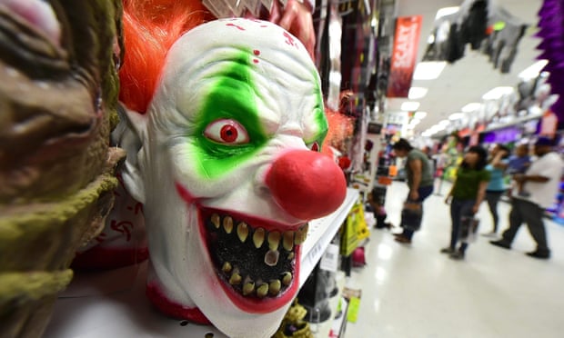 Clown masks are displayed and for sale at a shop in Alhambra, California on 21 October 2016. 