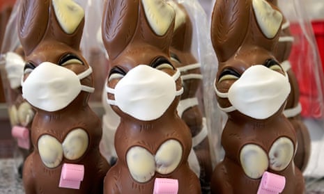 Chocolate Easter bunnies with mouth masks at the Wawi company in Pirmasens, Germany.
