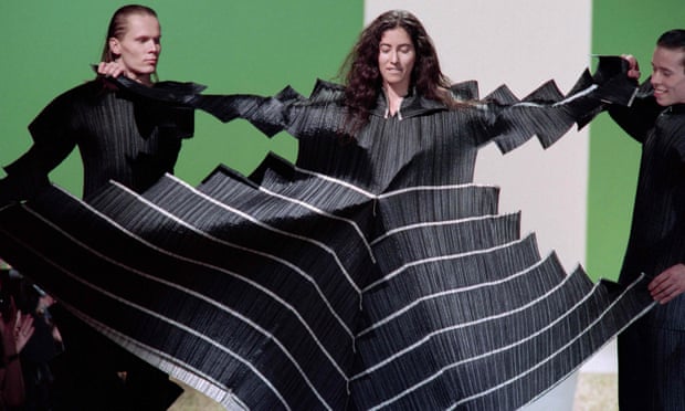 Models display pleats as part of the Issey Miyake Fall-Winter 1995 ready-to-wear collection in Paris.