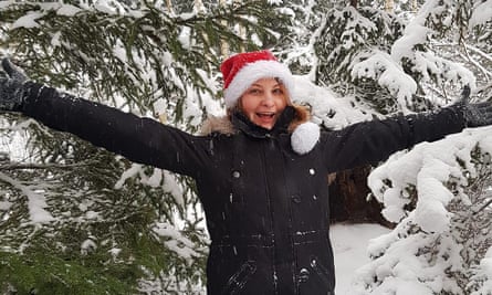Inga Rublite in snow with Santa hat