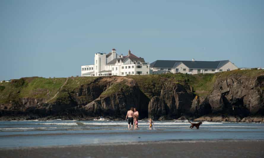 Shore leave: The Cliff Hotel, seen from Poppit Sands beach, Pembrokeshire.