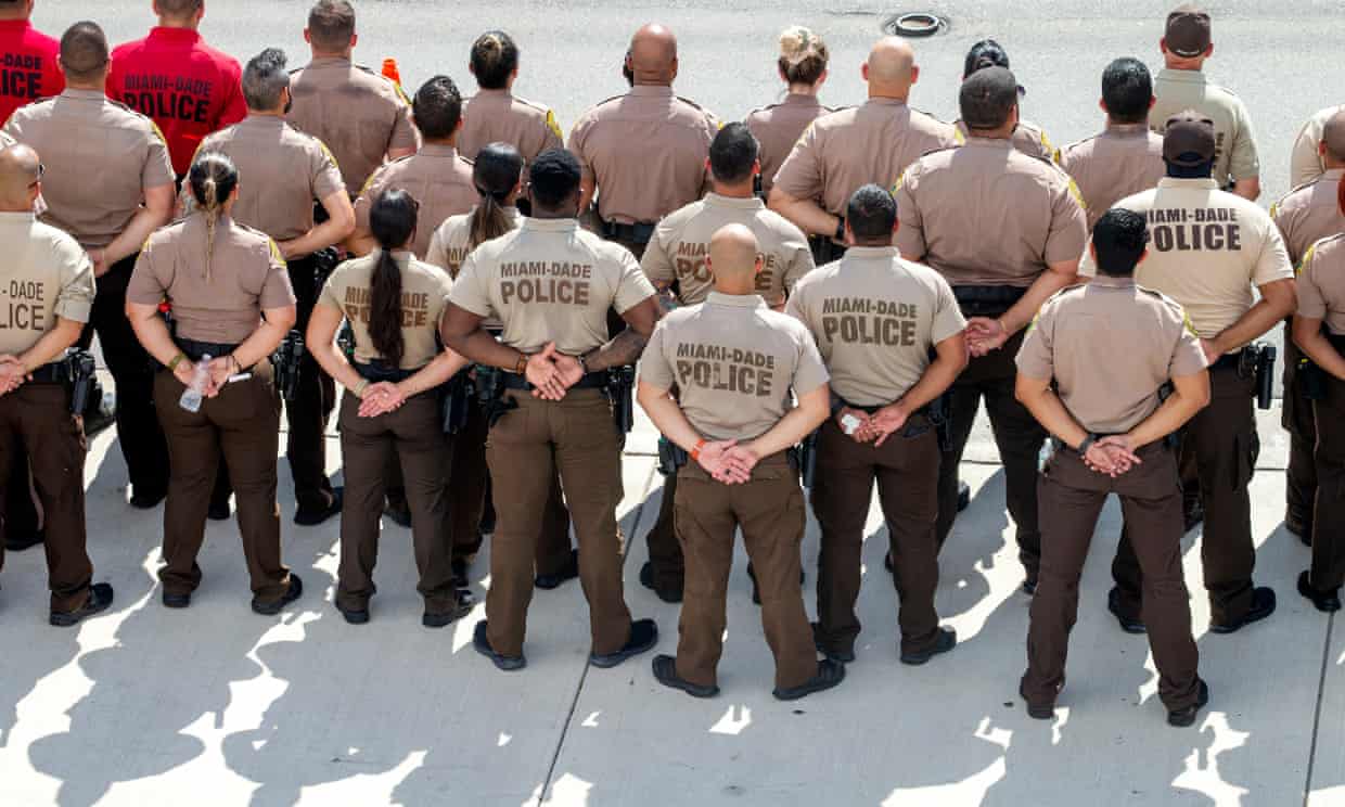 Florida police charged with beating homeless man