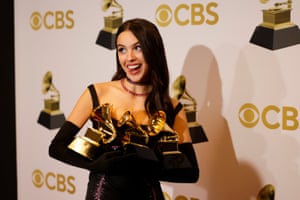 Olivia Rodrigo poses with her trophies at the 64th annual Grammy awards at the MGM Grand Garden Arena in Las Vegas