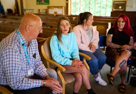 Nurses talk to residents at a community centre