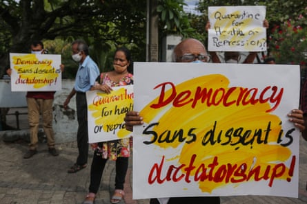 Sri Lankan civil rights activists and trade union members protest in Colombo on 16 June 2020. They say quarantine laws violate the democratic freedom of speech, assembly, and protest.