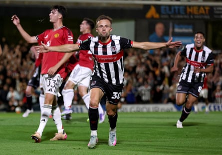 Charles Vernam shows his delight after giving Grimsby the lead.