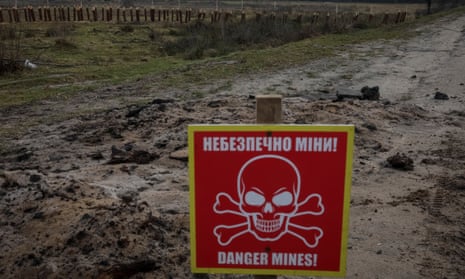 A mine danger sign and anti-tank construction near the border with Belarus in the Volyn region.