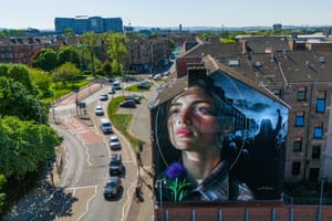 A mural of Mary Barbour on side of block of flats