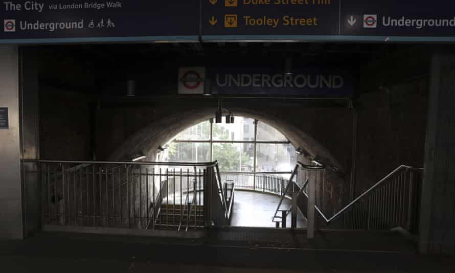 An empty stairway leading to London Bridge underground station in London.