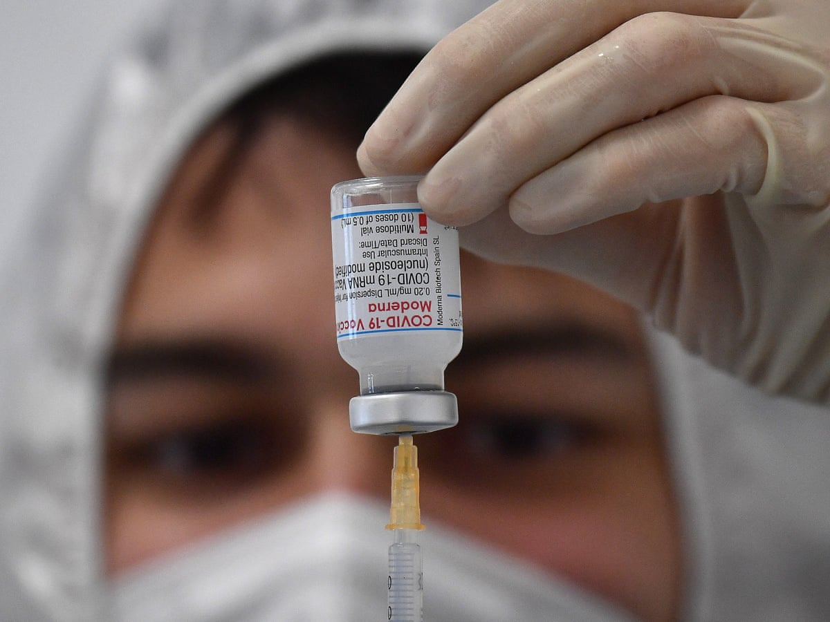 nhs covid vaccine booking website crashes as moderna rollout begins vaccines and immunisation the guardian