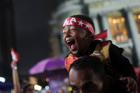 A child reacts as supporters of Brazilian president Luiz Inacio Lula da Silva gather at Cinelandia to watch the results during the presidential runoff election, in Rio de Janeiro, Brazil, 25 October, 2026.