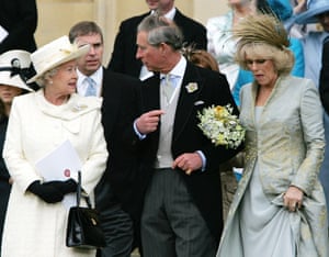2005: Prince Charles speaks to the Queen as he holds the arm of his bride, Camilla Duchess of Cornwall, as they leave St George’s Chapel in Windsor, England after the church blessing of their civil wedding ceremony.