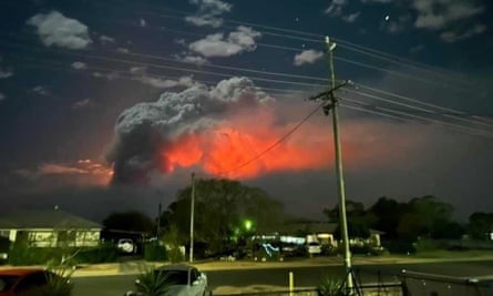 Billowing smoke in the night sky over Tara