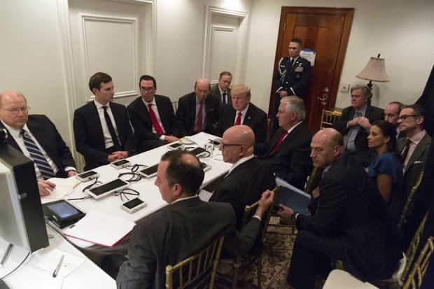 In this image provided by the White House, Donald Trump receives a briefing on Syria's military offensive at a secure location in Mar-a-Lago.