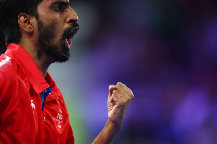 India’s Sathiyan Gnanasekaran reacts during his match against England’s Paul Drinkhall.