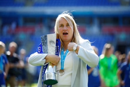 Chelsea manager Emma Hayes celebrates with the WSL trophy.
