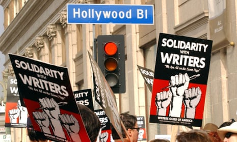 Demonstrators hold signs during the 2007-2008 Writers Guild of America strike in Hollywood. - Thousands of television and movie writers will go on strike from Tuesday after talks with studios and streamers over pay and other conditions ended without a deal.