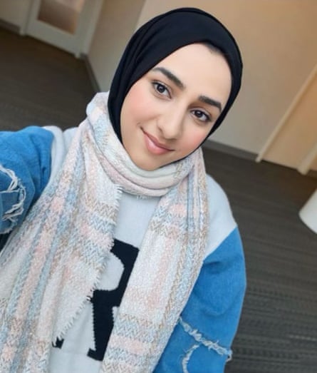 a teenage girl wearing a headscarf poses for a selfies