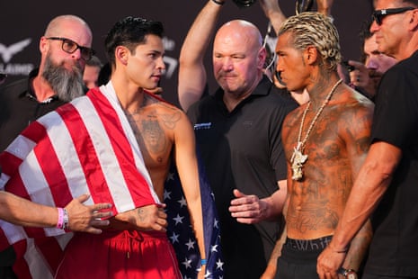 Ryan Garcia, left, and Conor Benn face off during FridayâÂÂs weigh-in ahead of their WBC welterweight title fight at T-Mobile Arena in Las Vegas.