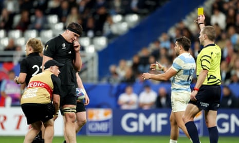 Scott Barrett of New Zealand is shown a yellow card by Referee Angus Gardner.