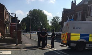 Police on a street in Wigan on Wednesday.