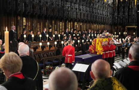 The coffin of Queen Elizabeth II is carried into St George’s chapel in Windsor Castle.
