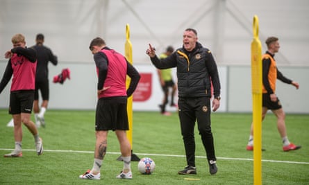 Manager Graham Coughlan takes training