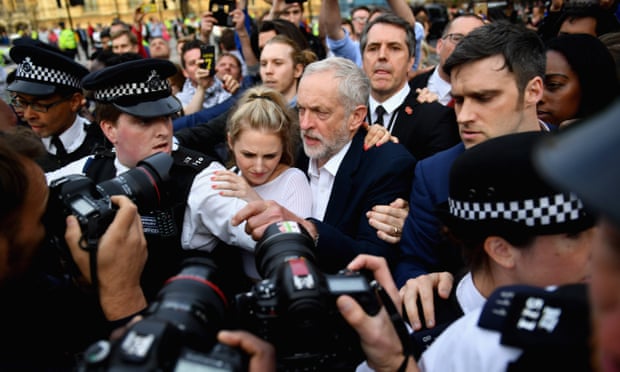 Jeremy Corbyn struggles through the crowd to deliver his speech outside the Houses of Parliament 