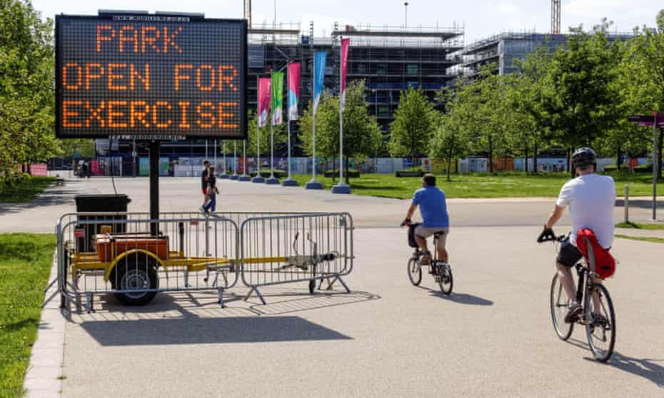 Information board in the Queen Elizabeth Olympic Park reminding people about the coronavirus lockdown rules in May 2020.