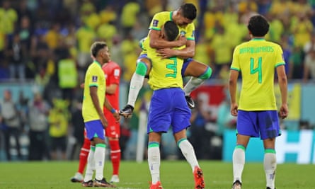 Brazil celebrate opening the scoring late on against Switzerland