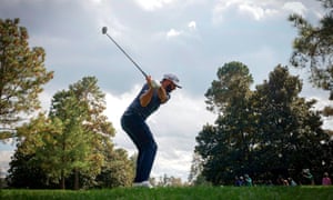A view from behind the tee as Dustin Johnson hits his tee shot on the 9th