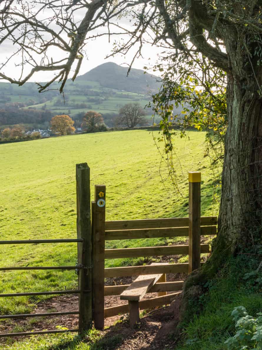 Offa’s Dyke National TrailStile with sign and view to the Skirrid.