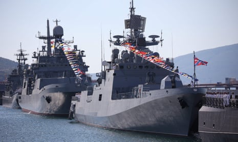 Warships from Russia's Black Sea fleet strung with flags