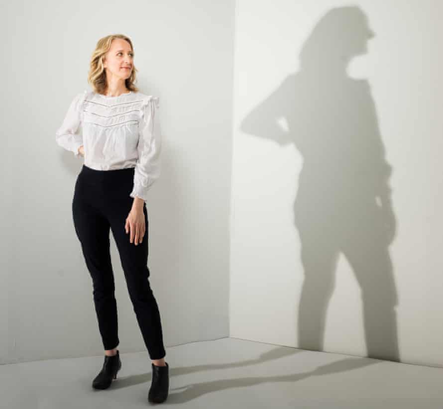 Hannah Booth and her shadow against white walls