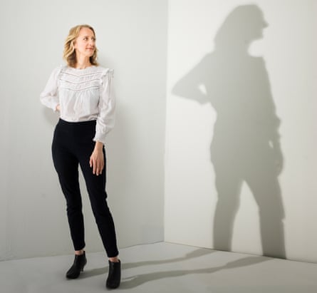 Hannah Booth and her shadow against white walls