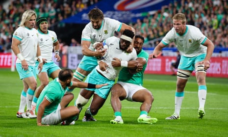 Siya Kolisi of South Africa is tackled by Ireland’s Bundee Aki during the Rugby World Cup match.