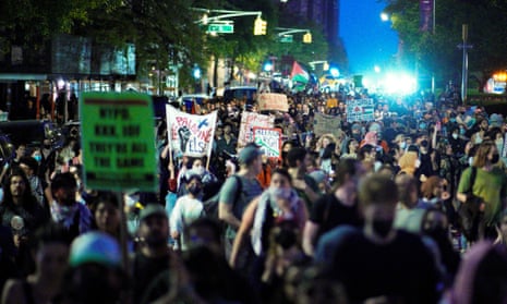 People attend a pro-Palestinian demonstration near the Met Gala.
