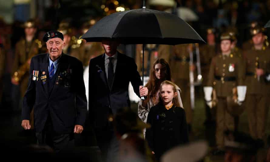 Dominic Perrottet, Premier of New South Wales, and his daughters attend the ceremony commemorating Anzac Day in Sydney, Australia, April 25, 2022
