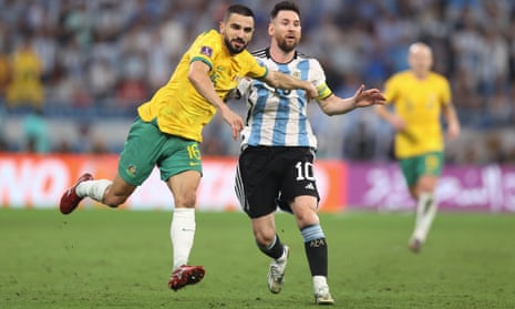 Aziz Behich of Australia (left) grapples with Lionel Messi of Argentina in Saturday’s last-16 encounter.